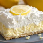 A freshly baked lemon dump cake with cream cheese, featuring a golden brown crust and creamy lemon filling.